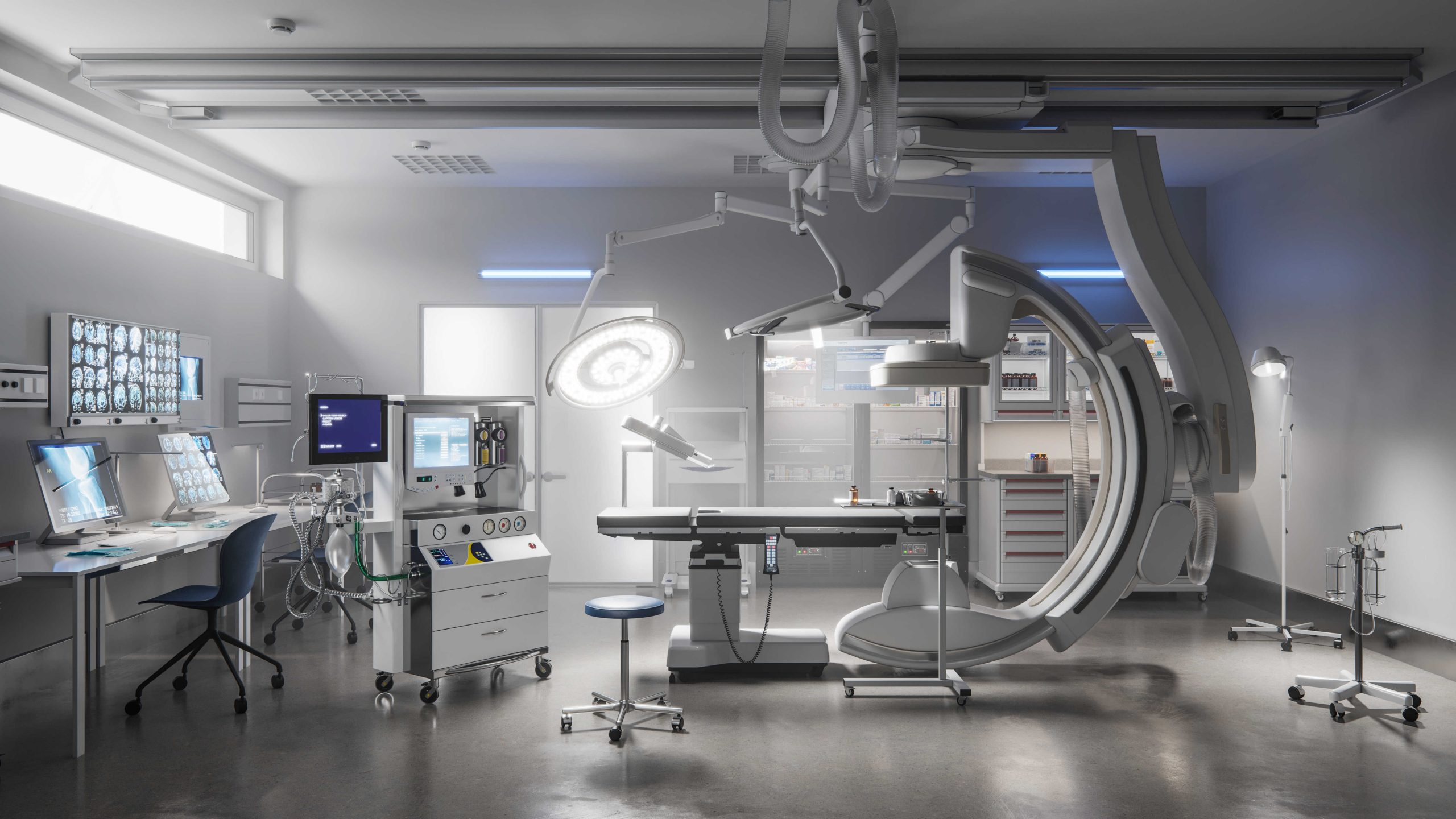 Modern hospital operating room with imaging monitors, surgical lights, anesthesia machine, and large C-arm scanner beside table
